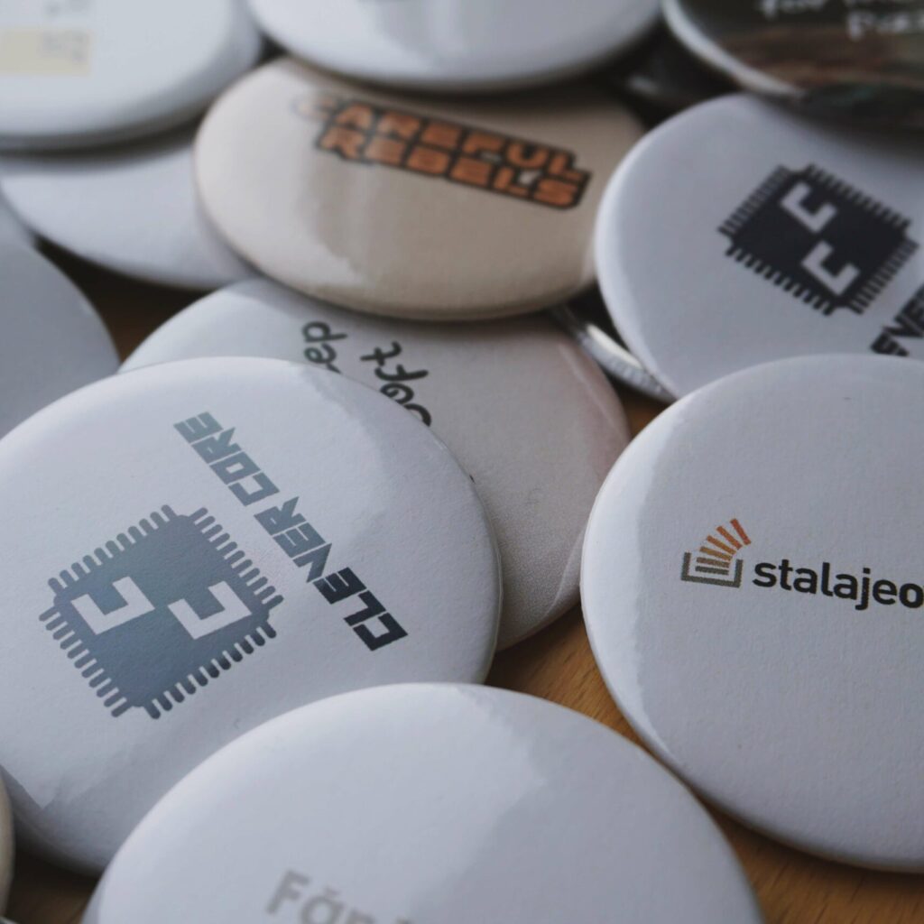 custom badges for team members, with logos designed for every team